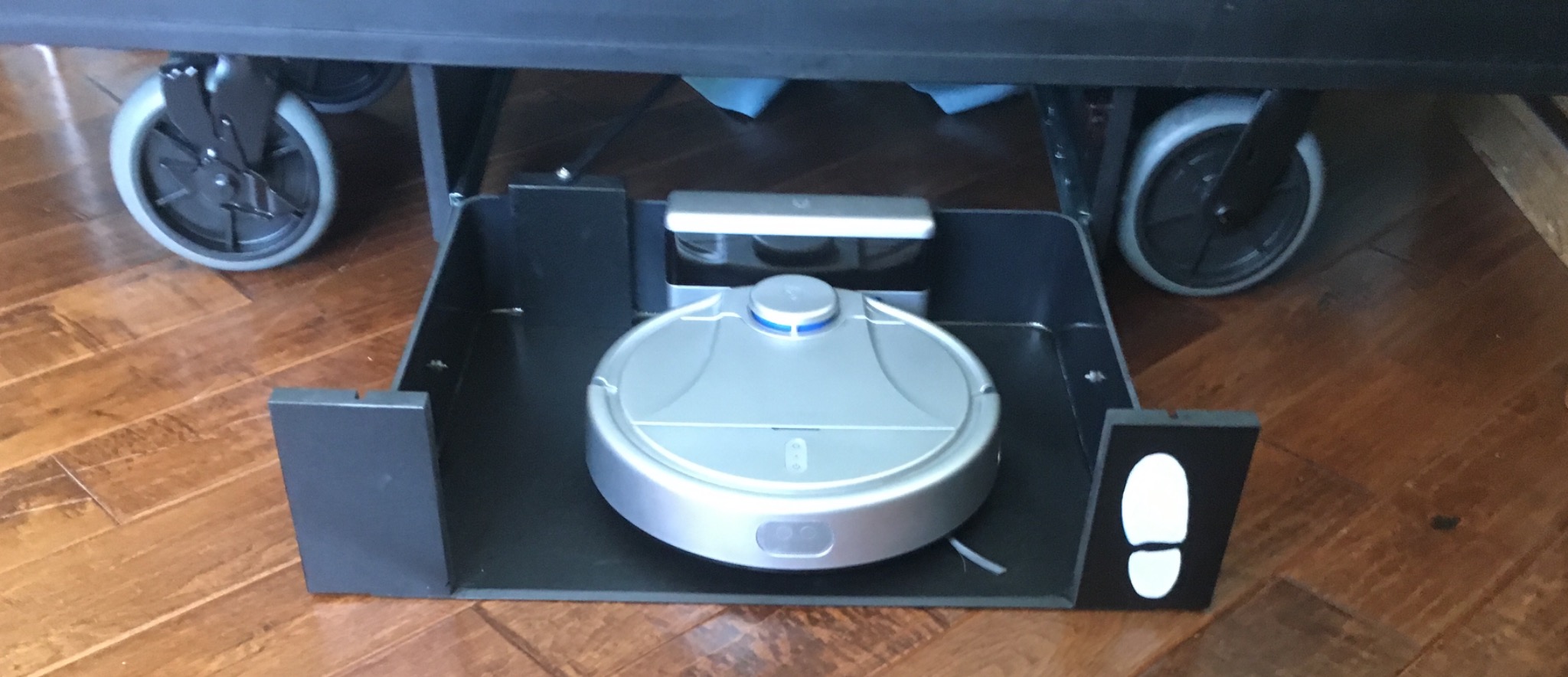 Bot Cave prototype beneath a maid's cart